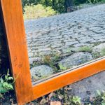 Spegel i trä fasetterat glas