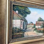 Liten tavla med motif i relief