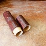 Liten cylindrisk ask