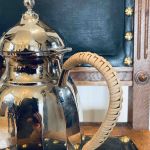 Kanna nysilver med rottinghandtag