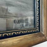 Metallram med äldre etsning