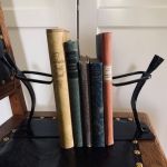 Set med 3 flaskhållare eller bokstöd - gjutjärn