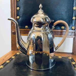 Kanna nysilver med rottinghandtag