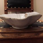 Snäckformat glas guldiga detaljer