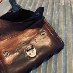 Gammal portmonnä i skinn