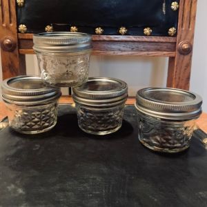 Set med 4 glasburkar lyktor