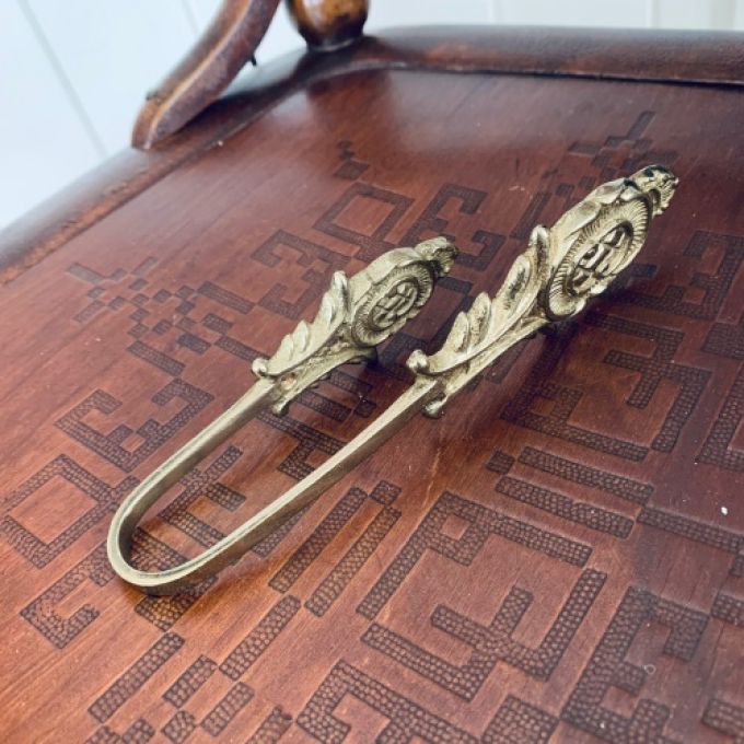 Gardinfäste mässing